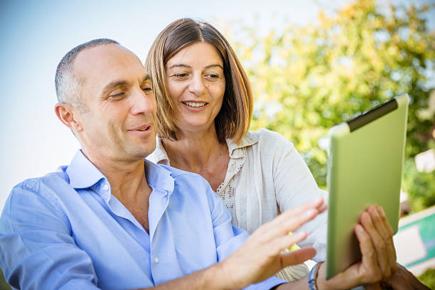 istock couple surfing on the web at resort 486522537