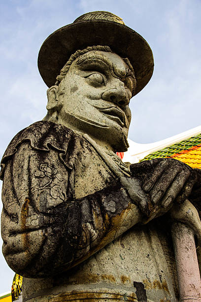 istock Wat Pho Chinese stone guardian 486522547