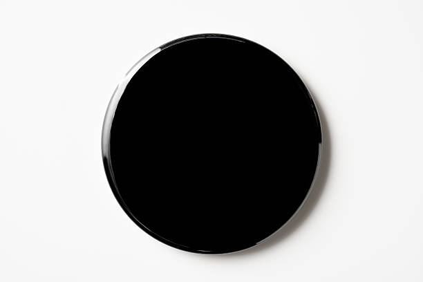 Isolated shot of blank black badge on white background Overhead shot of blank black badge isolated on white background with clipping path. campaign button photos stock pictures, royalty-free photos & images