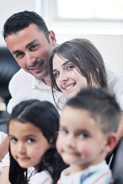 istock young family at home 486523183