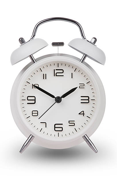 istock White alarm clock with the hands at 10 and 2 486523484