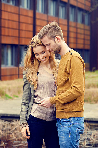 istock Young couple with mobile phone 486523779