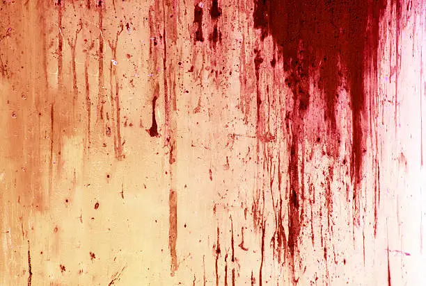 Photo of Halloween background. Blood on metal wall background