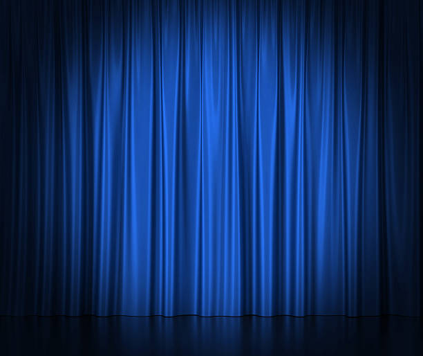 seta blu tende di teatro e cinema spotlit di luce - curtain foto e immagini stock