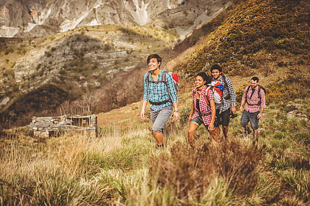 istock group of people hiking on the mountain 486524095
