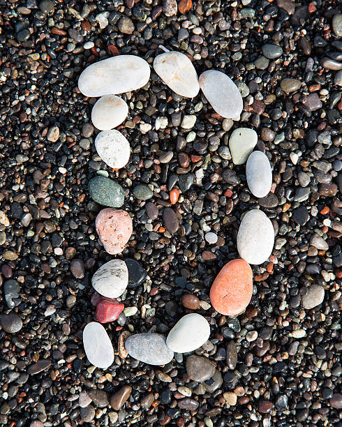 istock Letters alphabet  laid on a black sand 486524234