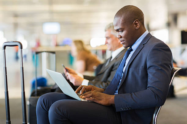 istock young african american businessman waiting for his flight 486524950