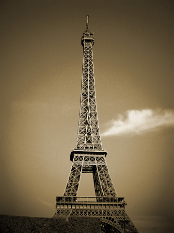 The Eiffel Towershown as taken from an old color film camera. Sepia toned.