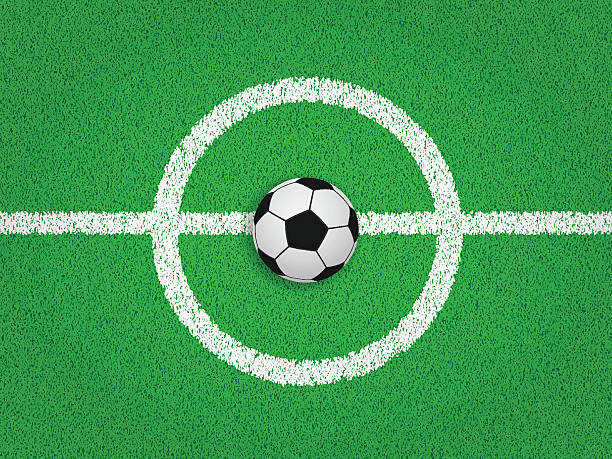 istock Football on the Center Circle, Green Playing Field 486525587
