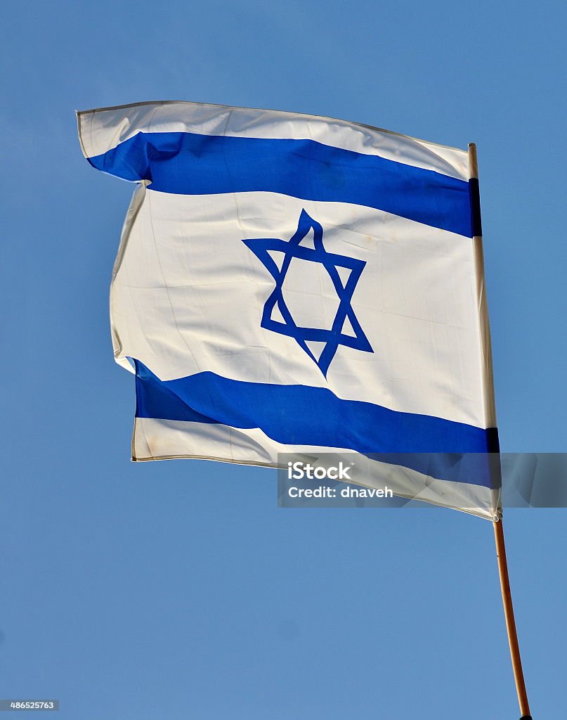 Israel Flag on Independence Day Israel flag in white and blue showing the Star of David hanging proudly for Israel's Independence Day (Yom Haatzmaut) Israeli Independence Day Stock Photo