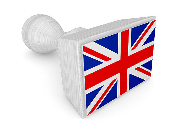 Wooden stamp with british flag. stock photo