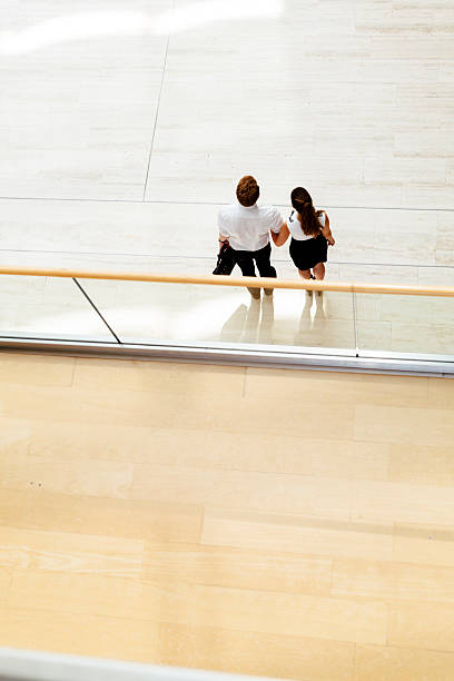 istock Business couple walking together 486534266
