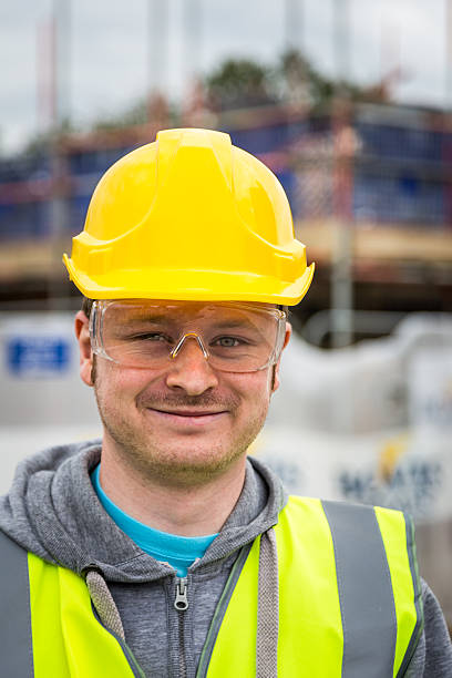 istock Young Caucasian Male Construction Worker Portrait Close Up 486534802
