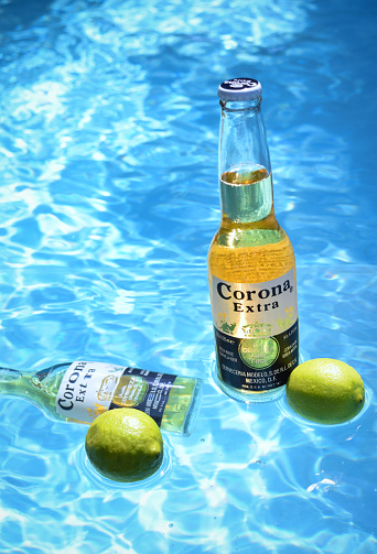 Belgrade, Serbia - August 27, 2015: Corona Extra shot in pool with limes.