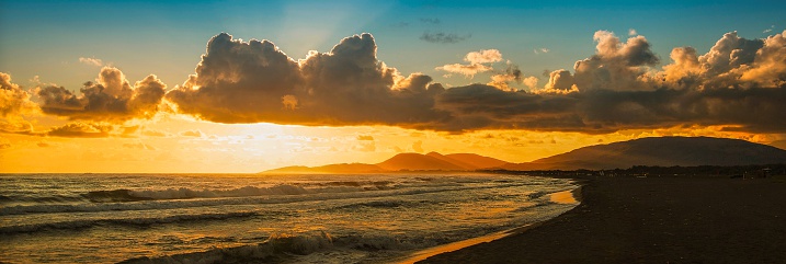 Surreal sunset landscape at the seaside in summer.