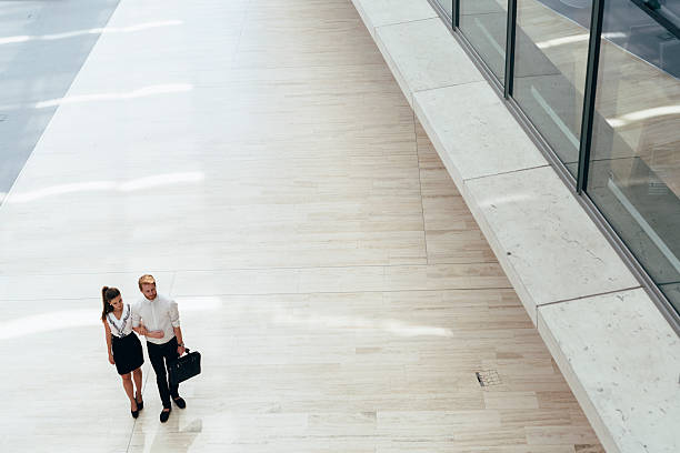 istock Business couple walking together 486538570
