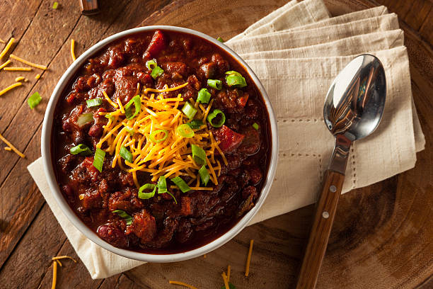 Homemade Organic Vegetarian Chili Homemade Organic Vegetarian Chili with Beans and Cheese chili pepper stock pictures, royalty-free photos & images