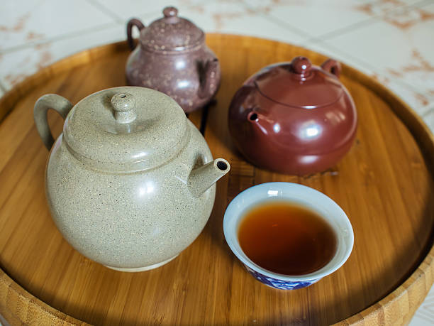 istock Chinese Teapot on teapot stand, made of bamboo. 486540630