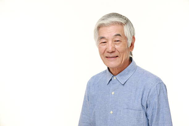 istock senior Japanese man smiles 486540720