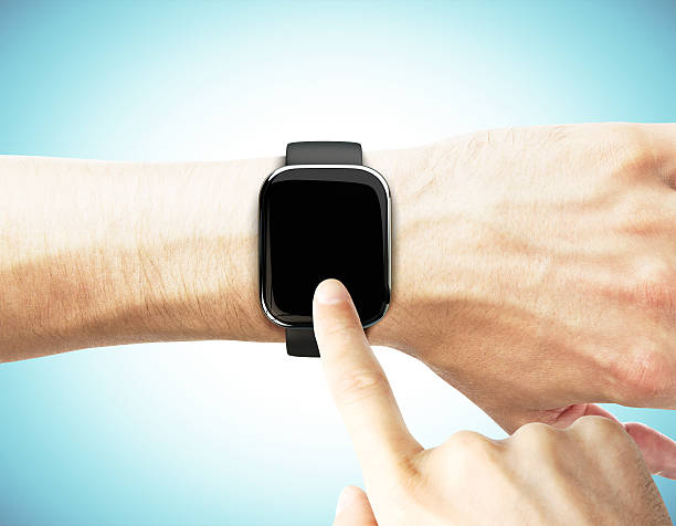 istock man uses a smart watch on a blue background 486547508