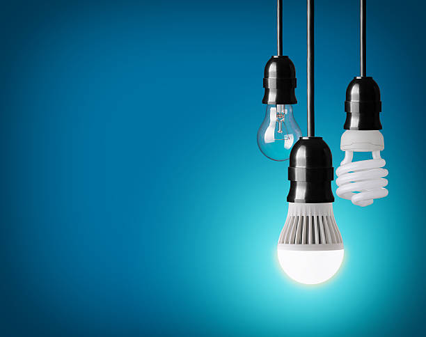 bombillas - compact fluorescent lightbulb fotografías e imágenes de stock