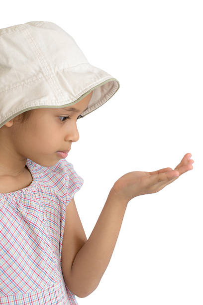 istock little girl holding open palm empty hand 486548605