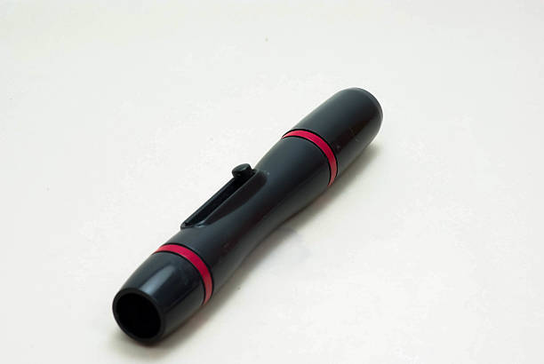 istock Pocket lens pen and brush for cleaning camera 486548926