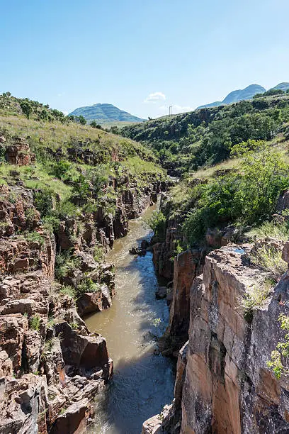 river at the bourkes potholes in south africa near the panoramaroute with big canyon and waterfalls