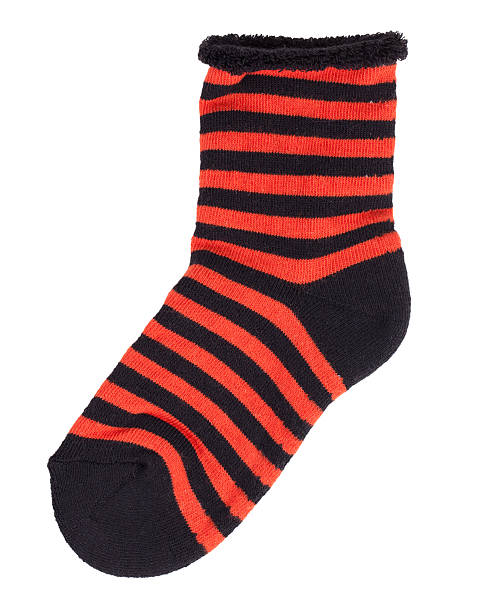 istock Sock in black and orange stripes 486549435