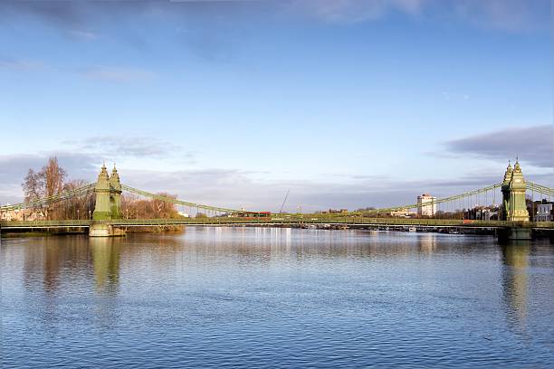 istock Hammersmith Bridge and south riverside of Thames 486549529