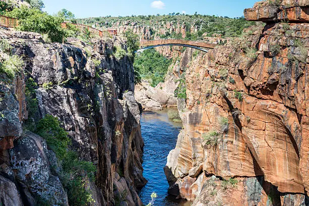 river at the bourkes potholes in south africa near the panoramaroute with big canyon and waterfalls