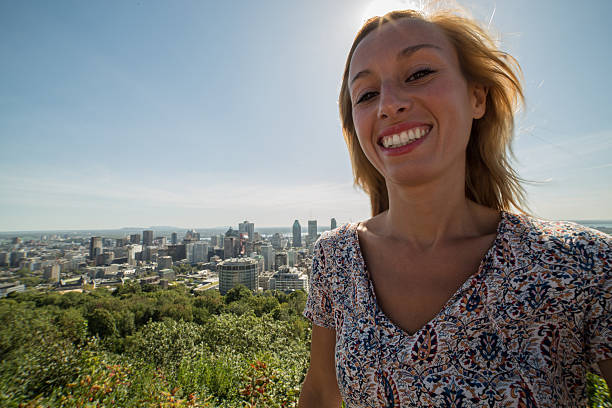 istock Woman taking selfie in Montreal-Summer 486550242