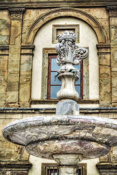 istock fountain in Santa Croce square in Florence 486550782