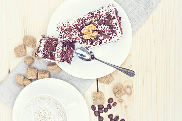 istock Delicious chocolate cake on plate on table on light background 486551294
