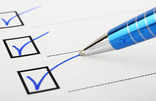 checklist and pen - checklist stockfoto's en -beelden