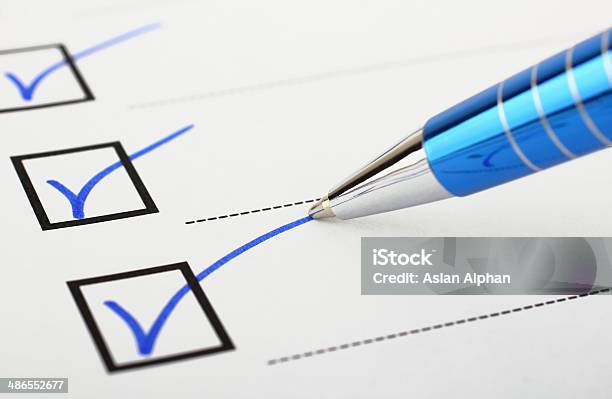 Checklist And Pen Stock Photo - Download Image Now - Checklist, Conformity, Examining