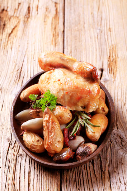 istock Chicken and baked potatoes 486553064