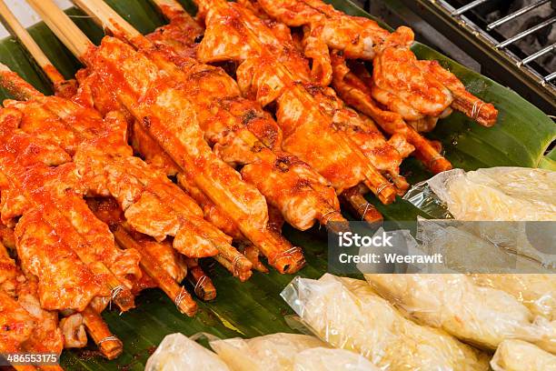 Thailand Style Of Grilled Chicken With Sticky Rice Stock Photo - Download Image Now - Barbecue Chicken, Barbecue Grill, Burning