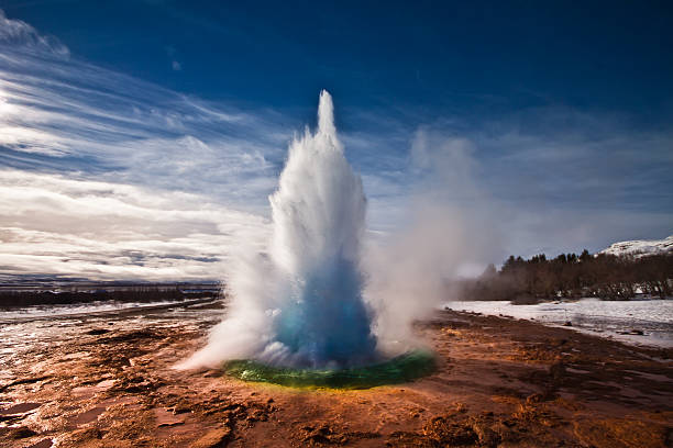 Strokkur Geyser Iceland Erupting Strokkur Geyser on a sunny day in Iceland natural landmark photos stock pictures, royalty-free photos & images