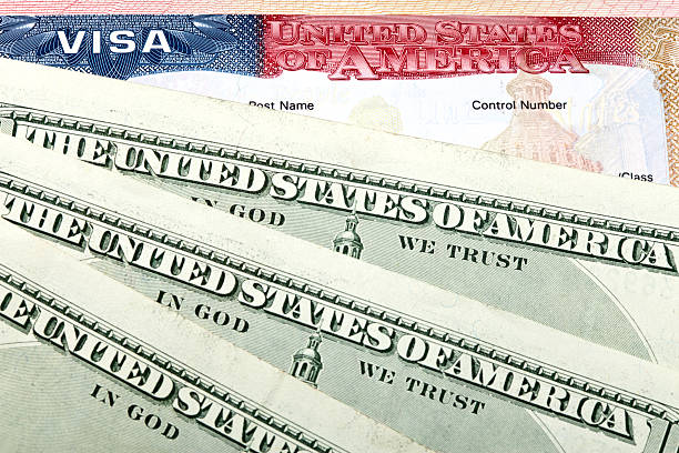 istock The American visa and US dollars 486553476