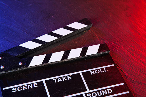 istock Cinema clapboard on black stone 486553982
