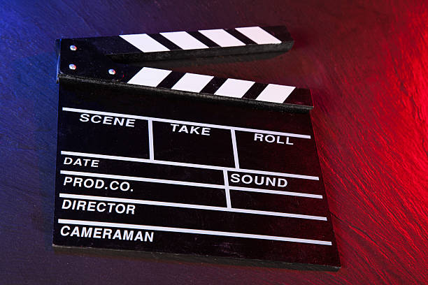 istock Cinema clapboard on black stone 486554304