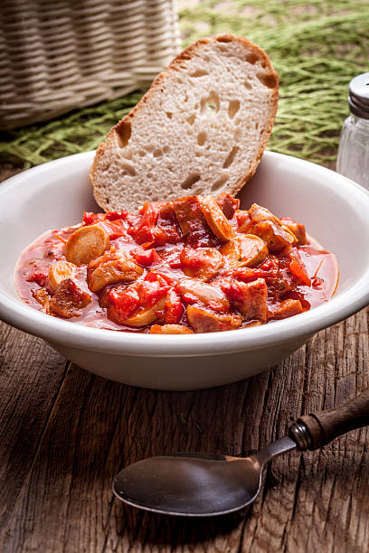 istock Lecho - stew with peppers, onions and sausages. 486554384