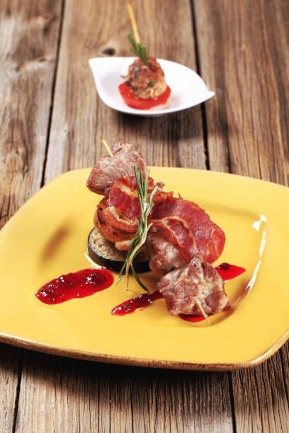 istock Venison souvlaki and bacon strip 486554682