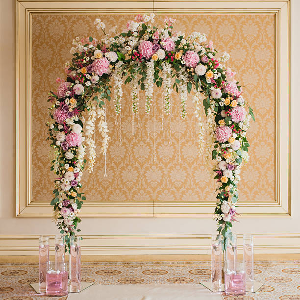 Archway decorated with mixed colorful flowers indoor