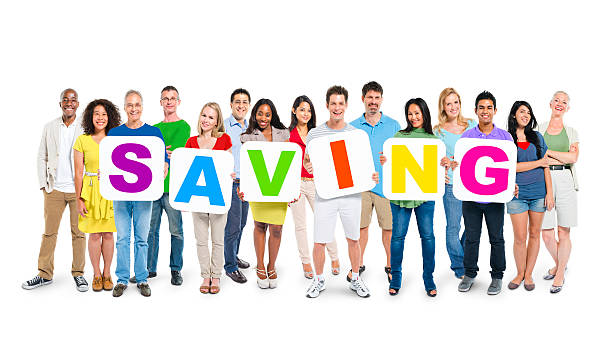 istock Multi-Ethnic Group Of People Holding Alphabet To Form Saving 486558820