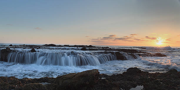 istock Panoramic Victoria beach rocks with water flowing 486559368