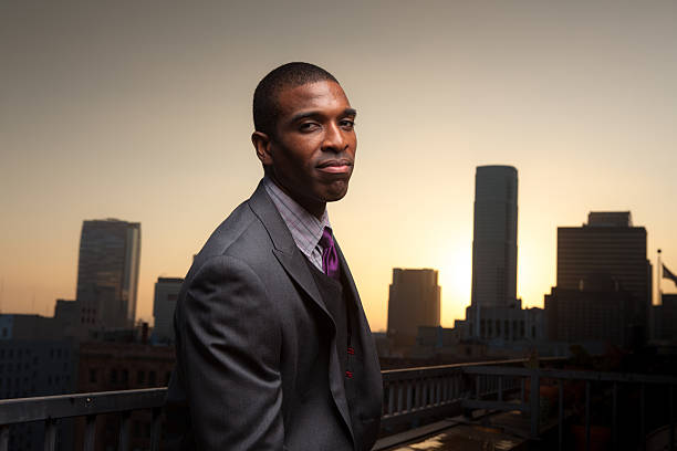 istock Businessman Standing on Balcony at Sunset 486560438