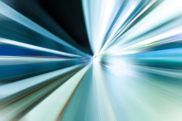 istock fast train traveling at high speed through a station 486560512