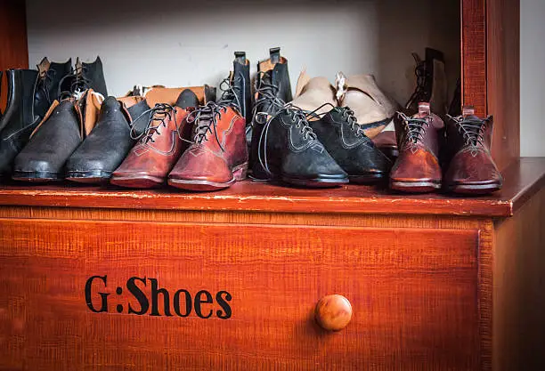 collection of men's dress shoes on display in a shop at Harper's Ferry, West Virginia